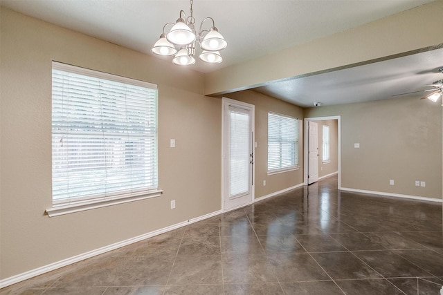 1414 Cheyenne Trl, Granbury, TX 76048 - spare room with plenty of natural light, a chandelier, and tile patterned flooring