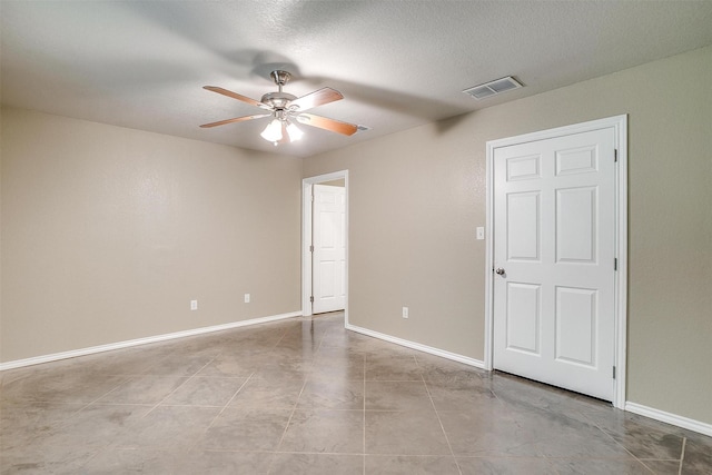 1414 Cheyenne Trl, Granbury, TX 76048 - empty room featuring a ceiling fan and a textured ceiling