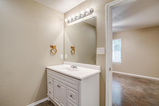 1414 Cheyenne Trl, Granbury, TX 76048 - bathroom featuring vanity and a textured wall