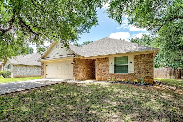 1414 Cheyenne Trl, Granbury, TX 76048 - ranch-style house with brick siding, a garage, concrete driveway, and roof with shingles
