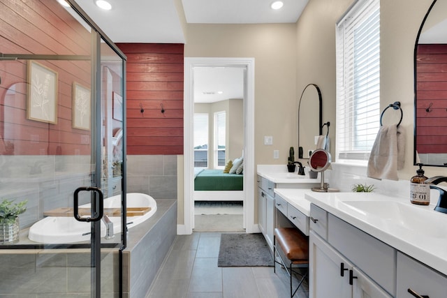 1415 Misty Pasture Way, Mansfield, TX 76063 - bathroom with double vanity, a bath, ensuite bath, a stall shower, and tile patterned flooring