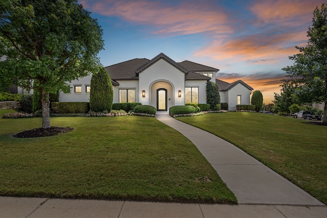 4673 Saint Benet Ct, Fort Worth, TX 76126 - french provincial home featuring a yard, a tiled roof, and stucco siding