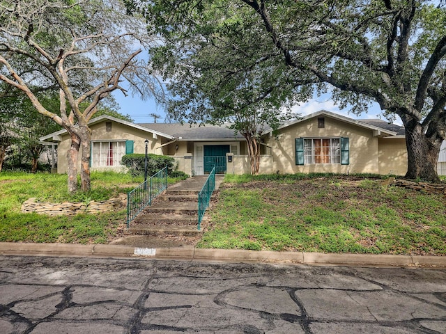 2641 Woodmont Cir, Waco, TX 76710 - view of front facade featuring stucco siding