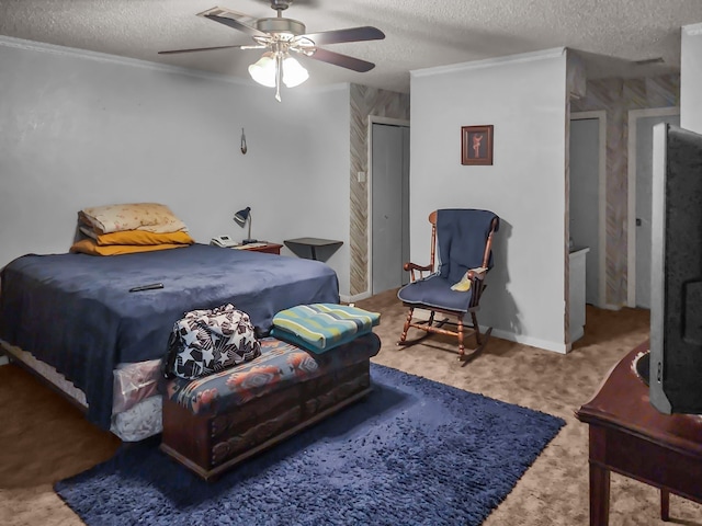 2641 Woodmont Cir, Waco, TX 76710 - bedroom with a textured ceiling, ornamental molding, carpet, ceiling fan, and a closet