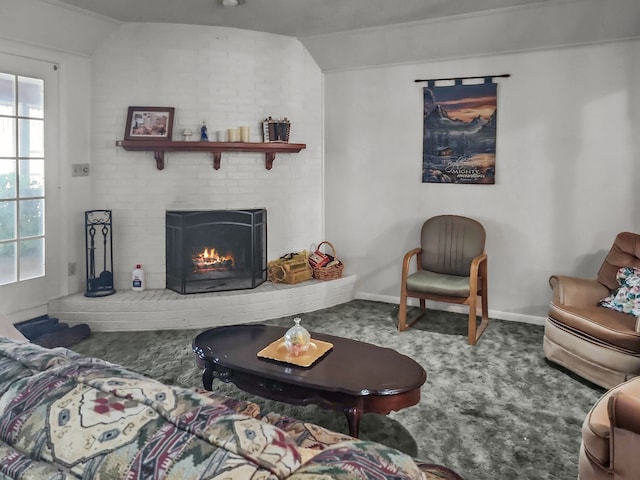 2641 Woodmont Cir, Waco, TX 76710 - living area featuring carpet, vaulted ceiling, and a brick fireplace