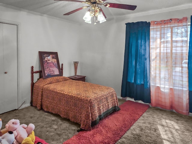 2641 Woodmont Cir, Waco, TX 76710 - bedroom with carpet floors, crown molding, and a ceiling fan