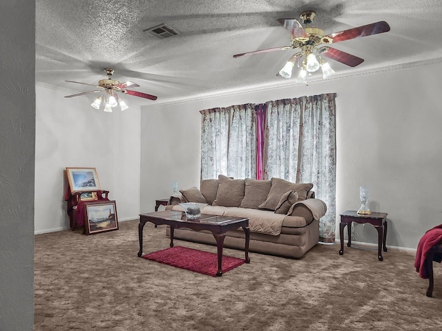 2641 Woodmont Cir, Waco, TX 76710 - living room with a ceiling fan, carpet flooring, ornamental molding, and a textured ceiling