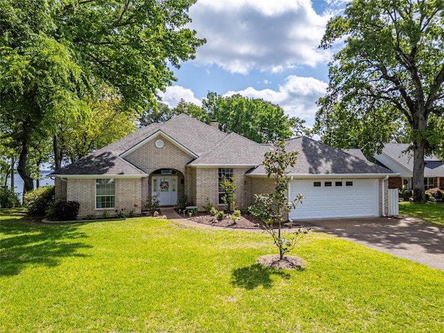 22770 Diamond Bay Dr, Frankston, TX 75763 - french country home featuring brick siding, driveway, an attached garage, and a front yard