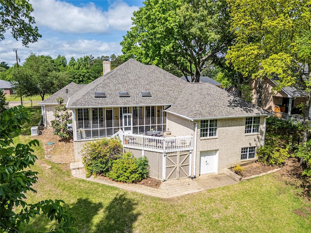 22770 Diamond Bay Dr, Frankston, TX 75763 - back of house featuring brick siding, a sunroom, roof with shingles, a chimney, and a yard