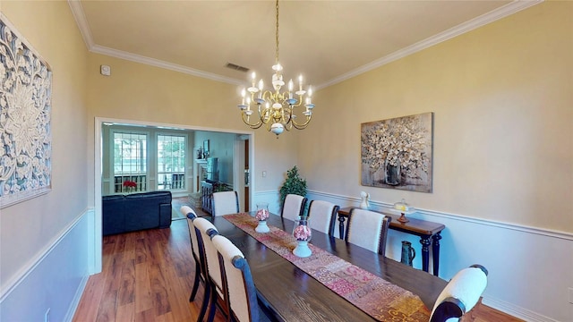 22770 Diamond Bay Dr, Frankston, TX 75763 - dining space featuring ornamental molding, wood finished floors, and a chandelier