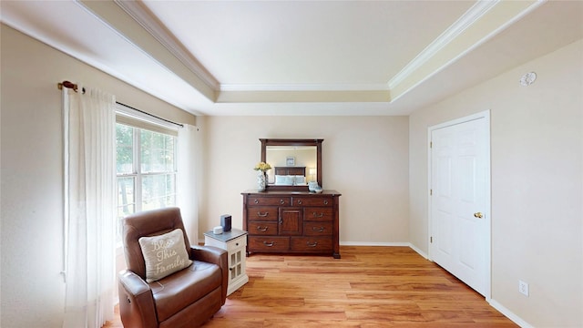 22770 Diamond Bay Dr, Frankston, TX 75763 - living area featuring a raised ceiling, light wood-style floors, and crown molding