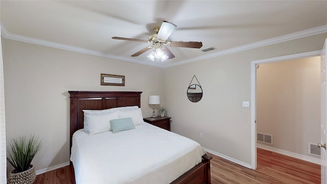 22770 Diamond Bay Dr, Frankston, TX 75763 - bedroom featuring light wood-style floors, ornamental molding, and a ceiling fan