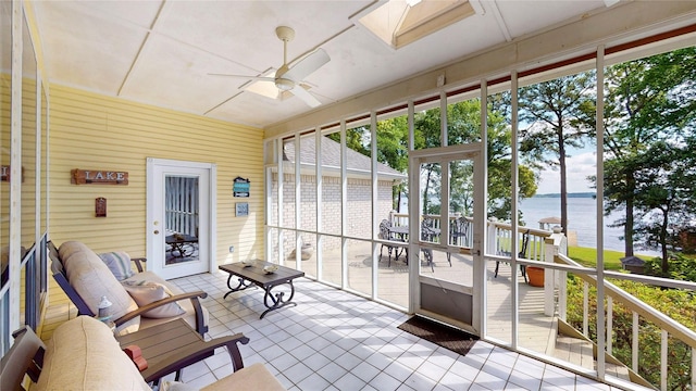 22770 Diamond Bay Dr, Frankston, TX 75763 - sunroom with a water view, ceiling fan, and a skylight