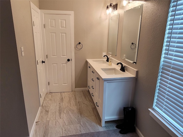 3309 Graybar Dr, Garland, TX 75040 - full bath with double vanity and marble finish flooring