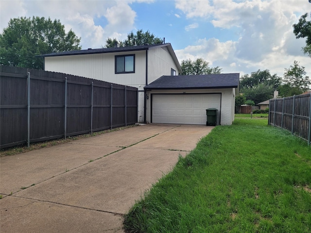 3309 Graybar Dr, Garland, TX 75040 - view of home's exterior with concrete driveway and brick siding
