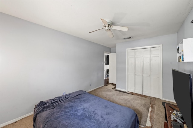 431 Brookwood Dr, Woodway, TX 76712 - bedroom with carpet, a closet, and a ceiling fan