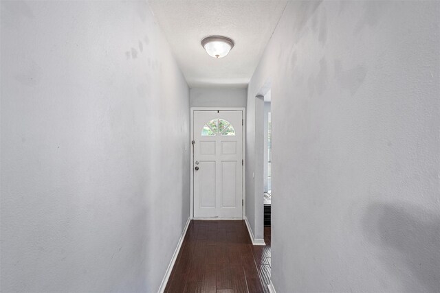431 Brookwood Dr, Woodway, TX 76712 - doorway to outside with baseboards and dark wood-style flooring