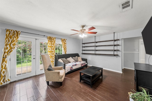 431 Brookwood Dr, Woodway, TX 76712 - living area featuring french doors, ceiling fan, wood finished floors, and a textured ceiling
