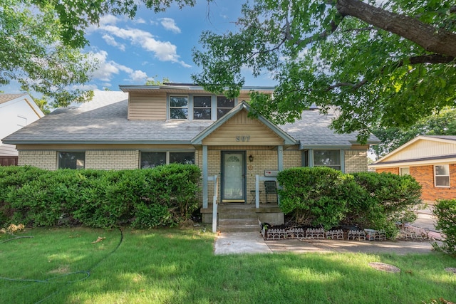 507 Vernet St, Richardson, TX 75080 - view of front facade with brick siding, a front yard, and roof with shingles