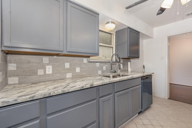 507 Vernet St, Richardson, TX 75080 - kitchen with dishwasher, gray cabinets, tasteful backsplash, and light tile patterned flooring