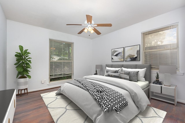 507 Vernet St, Richardson, TX 75080 - bedroom with wood finished floors, multiple windows, and a ceiling fan