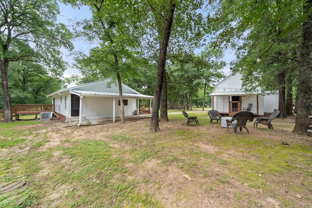 3121 SE County Road 2135, Corsicana, TX 75109 - view of yard with an outdoor fire pit