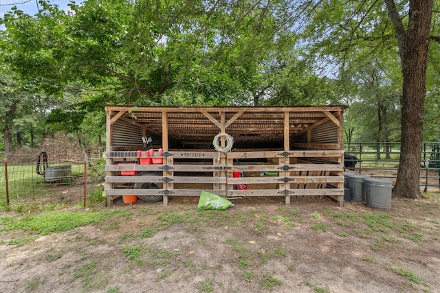 3121 SE County Road 2135, Corsicana, TX 75109 - view of outbuilding with an exterior structure and view of wooded area
