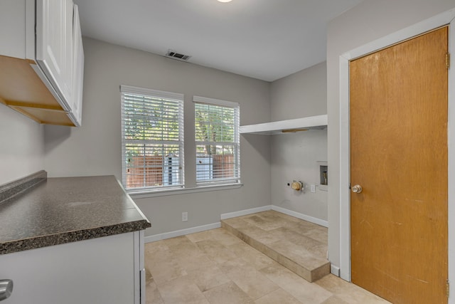 11502 Rupley Ln, Dallas, TX 75218 - washroom with baseboards