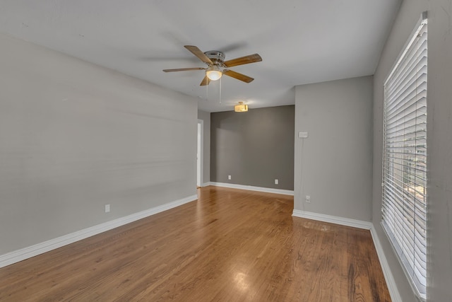 11502 Rupley Ln, Dallas, TX 75218 - unfurnished room featuring a ceiling fan and wood finished floors