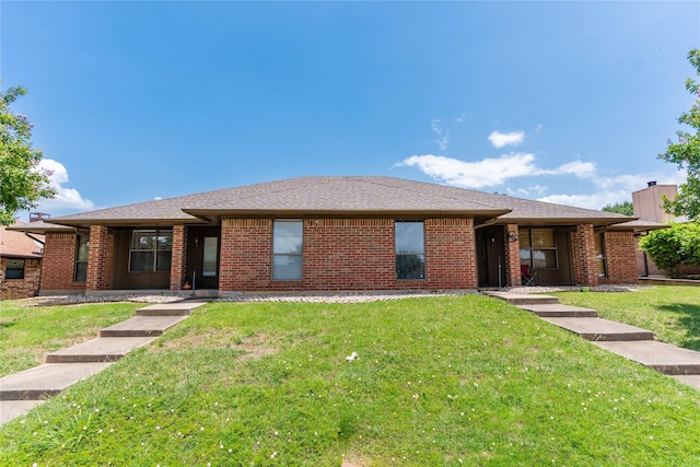1638 Brown Trl, Hurst, TX 76054 - view of front of home with a front yard and brick siding