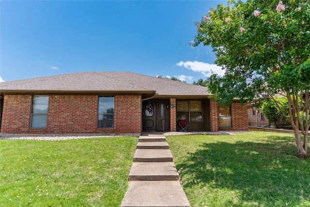 1638 Brown Trl, Hurst, TX 76054 - ranch-style home with brick siding, a front lawn, and a shingled roof