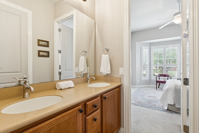 6044 Larkspur Ln, Frisco, TX 75036 - full bath featuring double vanity, a ceiling fan, and connected bathroom
