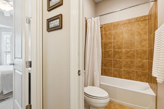 6044 Larkspur Ln, Frisco, TX 75036 - bathroom featuring shower / bath combo with shower curtain and tile patterned floors