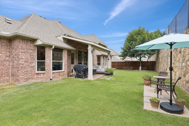6044 Larkspur Ln, Frisco, TX 75036 - fenced backyard with an outdoor hangout area and a patio
