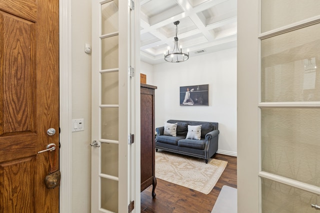 6044 Larkspur Ln, Frisco, TX 75036 - corridor featuring coffered ceiling, dark wood-type flooring, beam ceiling, and a chandelier