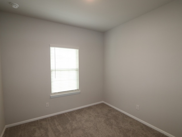 453 Forsyth Dr, Princeton, TX 75407 - carpeted spare room with healthy amount of natural light and a smoke detector