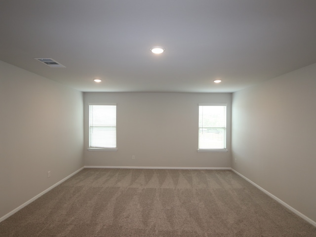 453 Forsyth Dr, Princeton, TX 75407 - spare room featuring carpet and recessed lighting