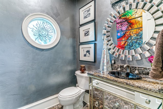 1600 Crockett Cir, Irving, TX 75038 - bathroom with a textured wall and vanity