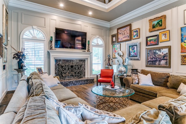 1600 Crockett Cir, Irving, TX 75038 - living area featuring a decorative wall, crown molding, wood finished floors, a fireplace, and recessed lighting