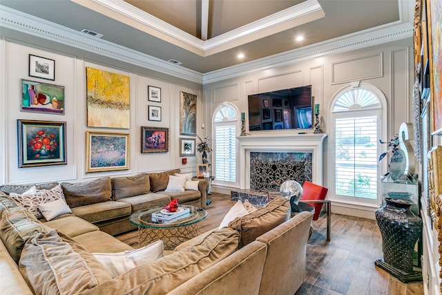 1600 Crockett Cir, Irving, TX 75038 - living room with ornamental molding, dark wood-type flooring, healthy amount of natural light, a fireplace, and a decorative wall