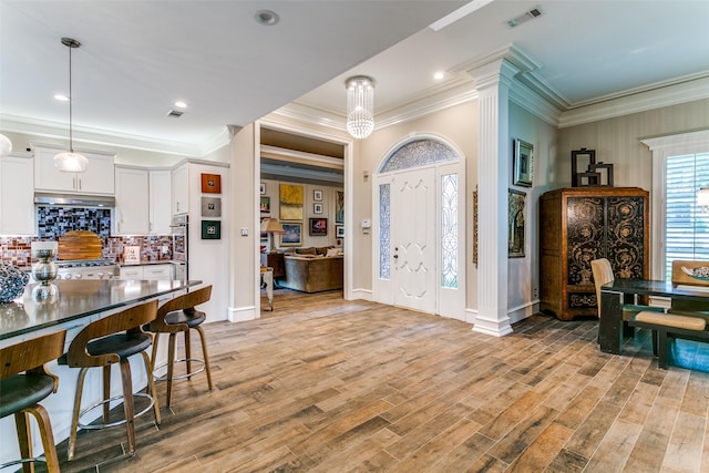 1600 Crockett Cir, Irving, TX 75038 - foyer entrance with ornamental molding and light wood-type flooring