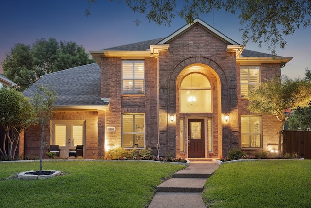 3805 Blaylock Pl, Plano, TX 75025 - traditional-style home featuring brick siding, french doors, and roof with shingles