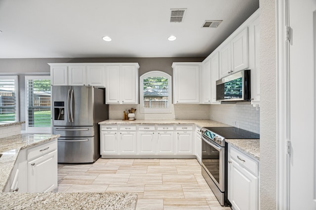 3805 Blaylock Pl, Plano, TX 75025 - kitchen with stainless steel appliances, backsplash, healthy amount of natural light, and recessed lighting