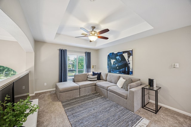 3805 Blaylock Pl, Plano, TX 75025 - carpeted living room featuring a raised ceiling and ceiling fan