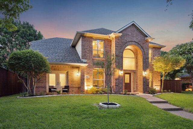 3805 Blaylock Pl, Plano, TX 75025 - traditional home with brick siding, french doors, and roof with shingles