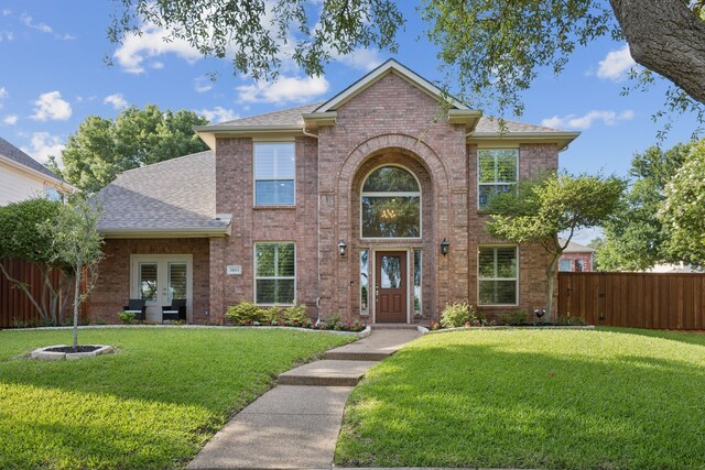 3805 Blaylock Pl, Plano, TX 75025 - traditional home with brick siding and a shingled roof