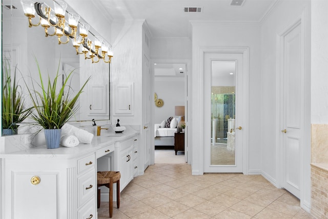 3928 Dove Creek Ln, Plano, TX 75093 - ensuite bathroom with vanity, crown molding, a chandelier, and tile patterned flooring
