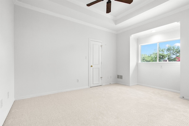 3928 Dove Creek Ln, Plano, TX 75093 - spare room with a ceiling fan, light carpet, crown molding, and a raised ceiling