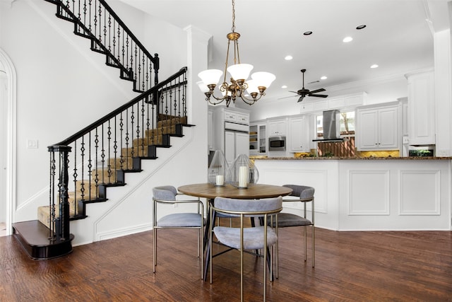 3928 Dove Creek Ln, Plano, TX 75093 - dining room with ceiling fan, dark wood-type flooring, stairs, a chandelier, and recessed lighting
