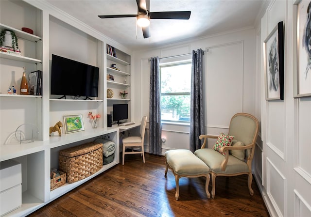 8803 Westglen Dr, Dallas, TX 75228 - sitting room with ceiling fan, dark wood-style floors, ornamental molding, built in features, and a desk